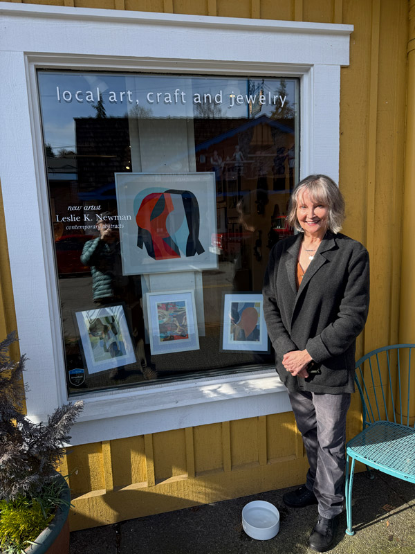 Leslie standing outside in front of the gallery window